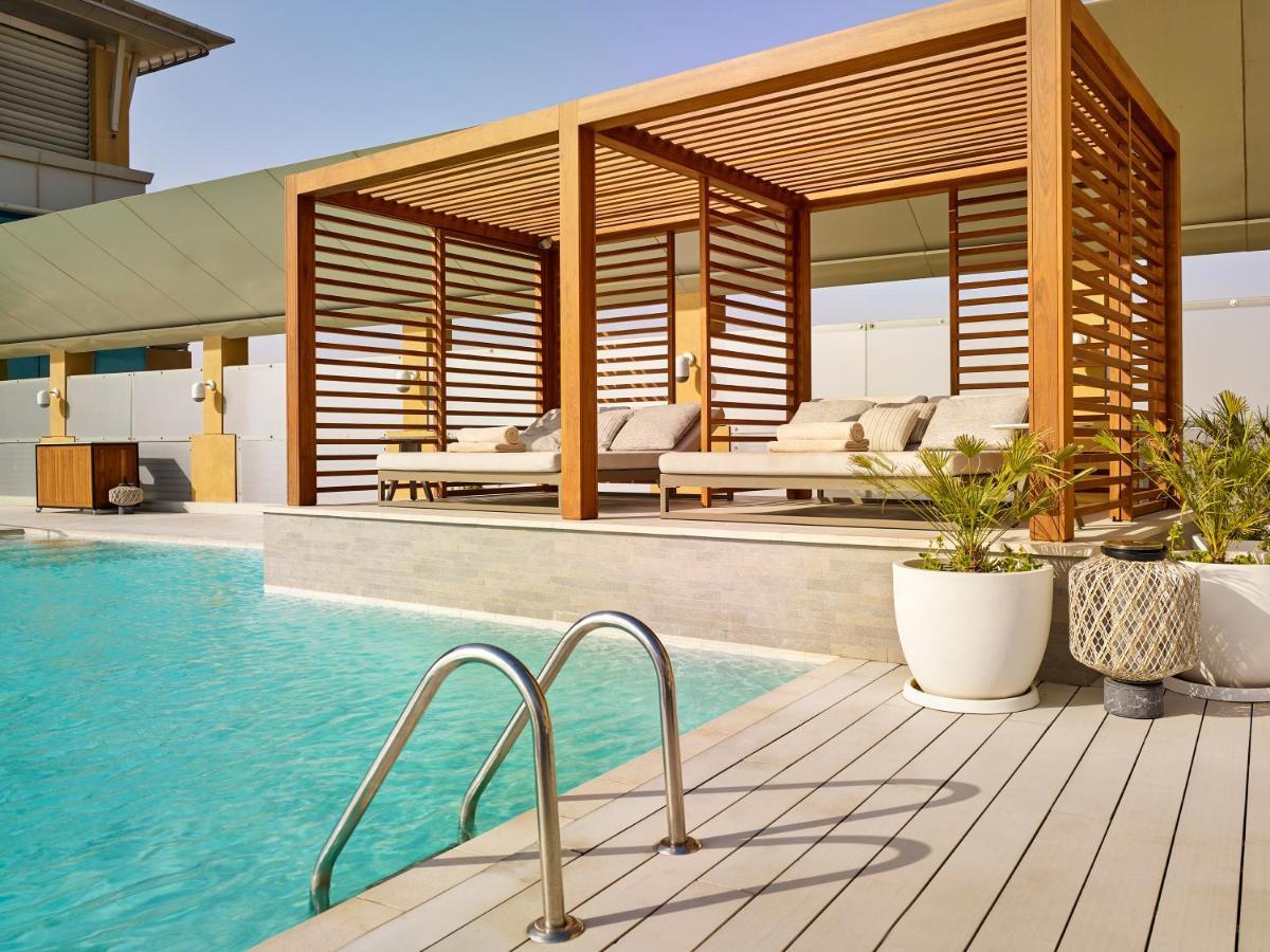 Hyatt Regency Al Kout Mall Кувейт Екстериор снимка The swimming pool at the hotel